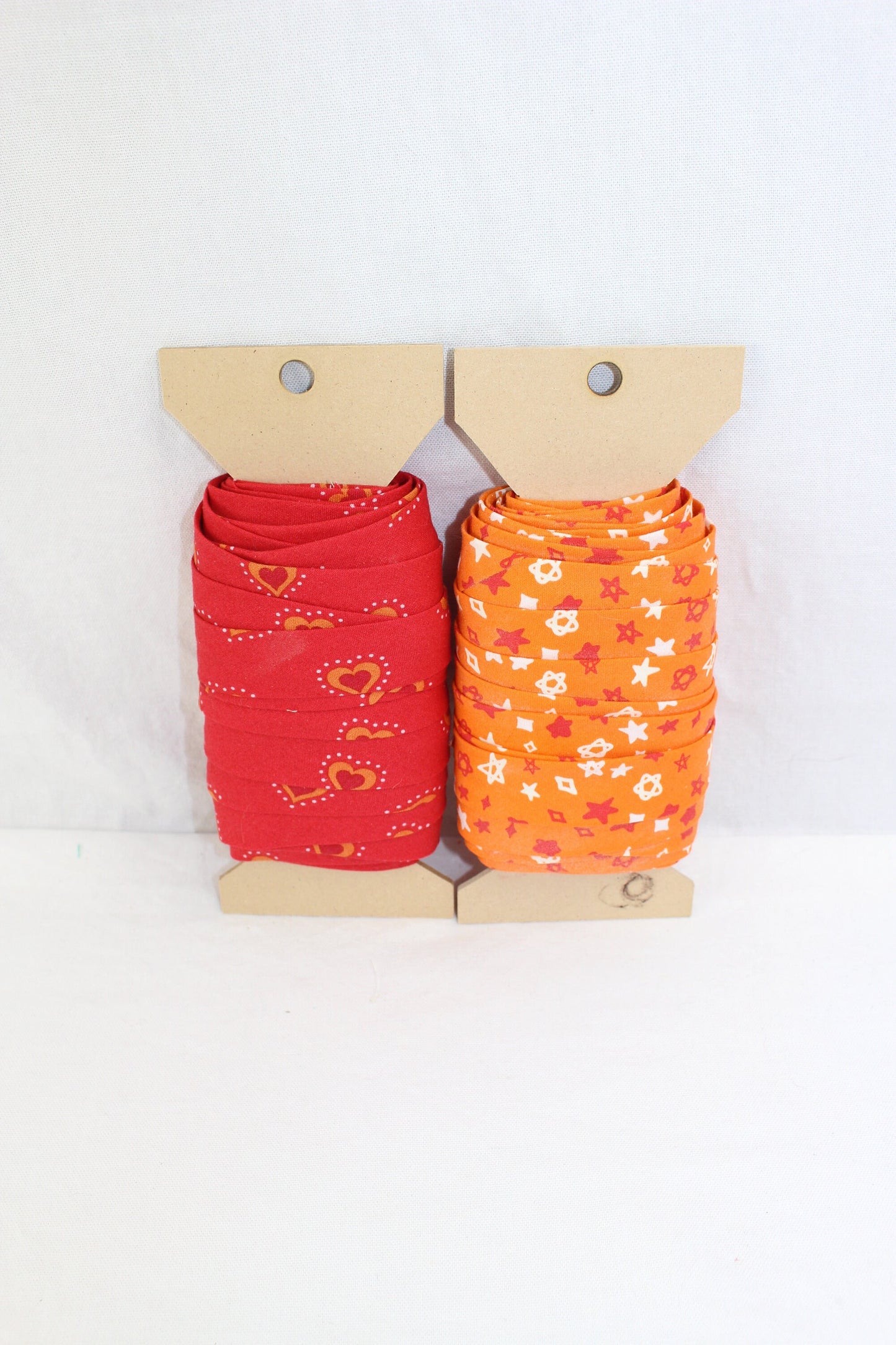 Bias Binding (Tape) 25mm, Cotton, Single Fold, orange, red, patterned. Fusible iron on available.
