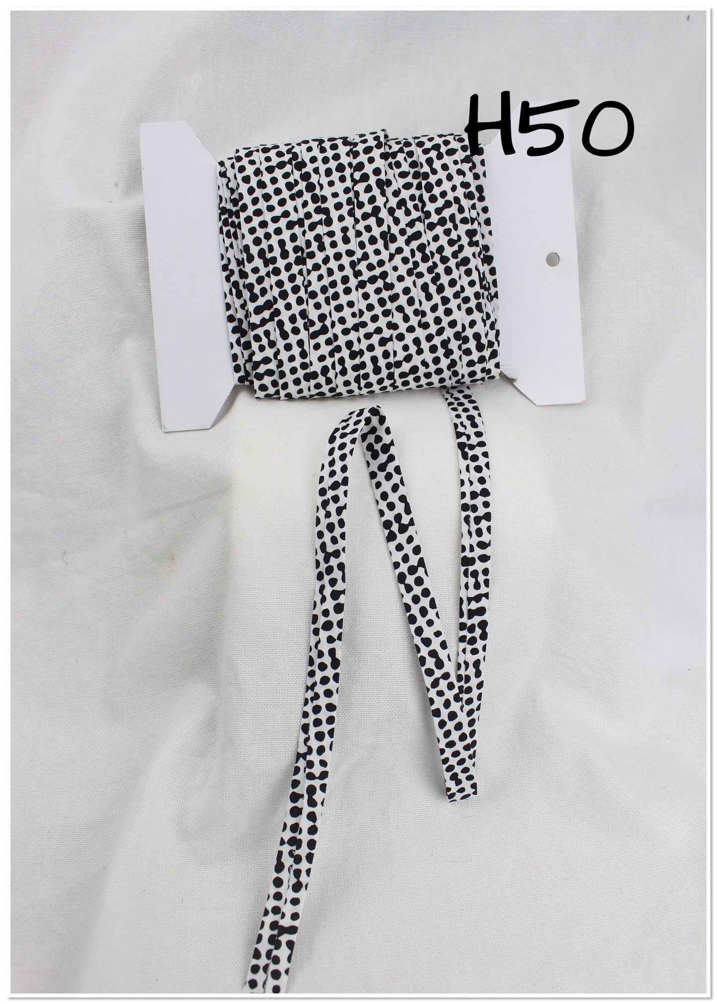 Bias Binding (Tape) 12mm, Cotton, Single Fold, black and white dots and stripes. Fusible iron on available.