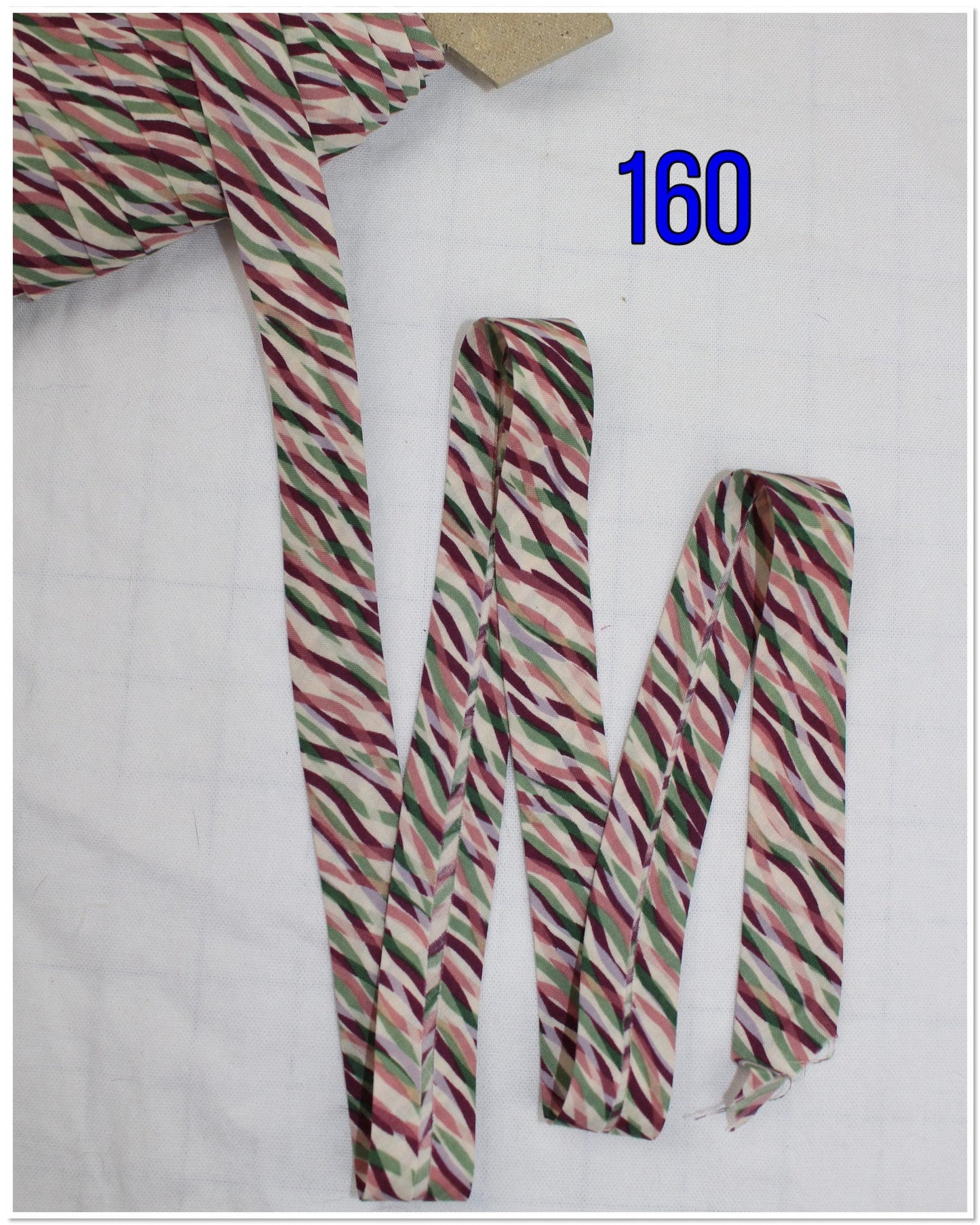 Bias Binding (Tape) 25mm, Cotton, Single Fold. Fusible iron on available. swirls, splats and wavey lines.