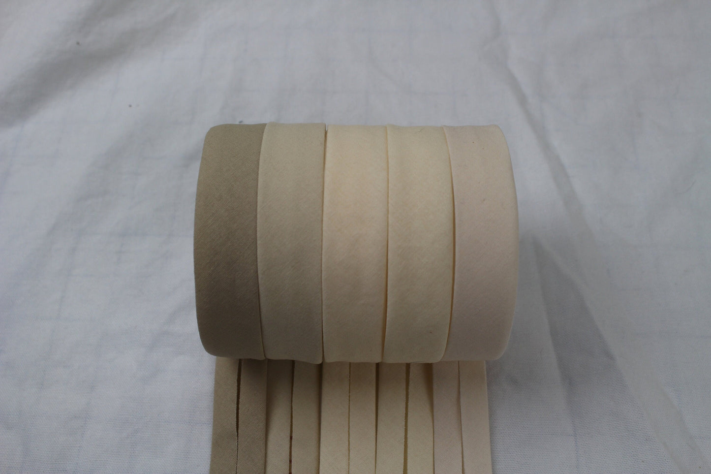 Bias Binding (tape) 25mm or 12mm, single fold, 100% Cotton. tan, beige, cream. Fusible iron on available.
