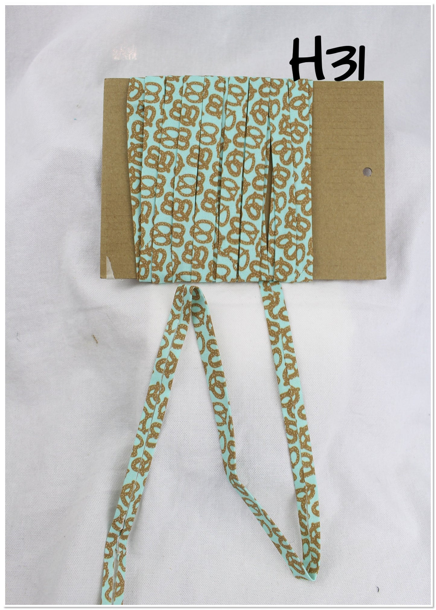 Bias Binding (Tape) 12mm, Cotton, Single Fold, pretzels. Fusible iron on available.