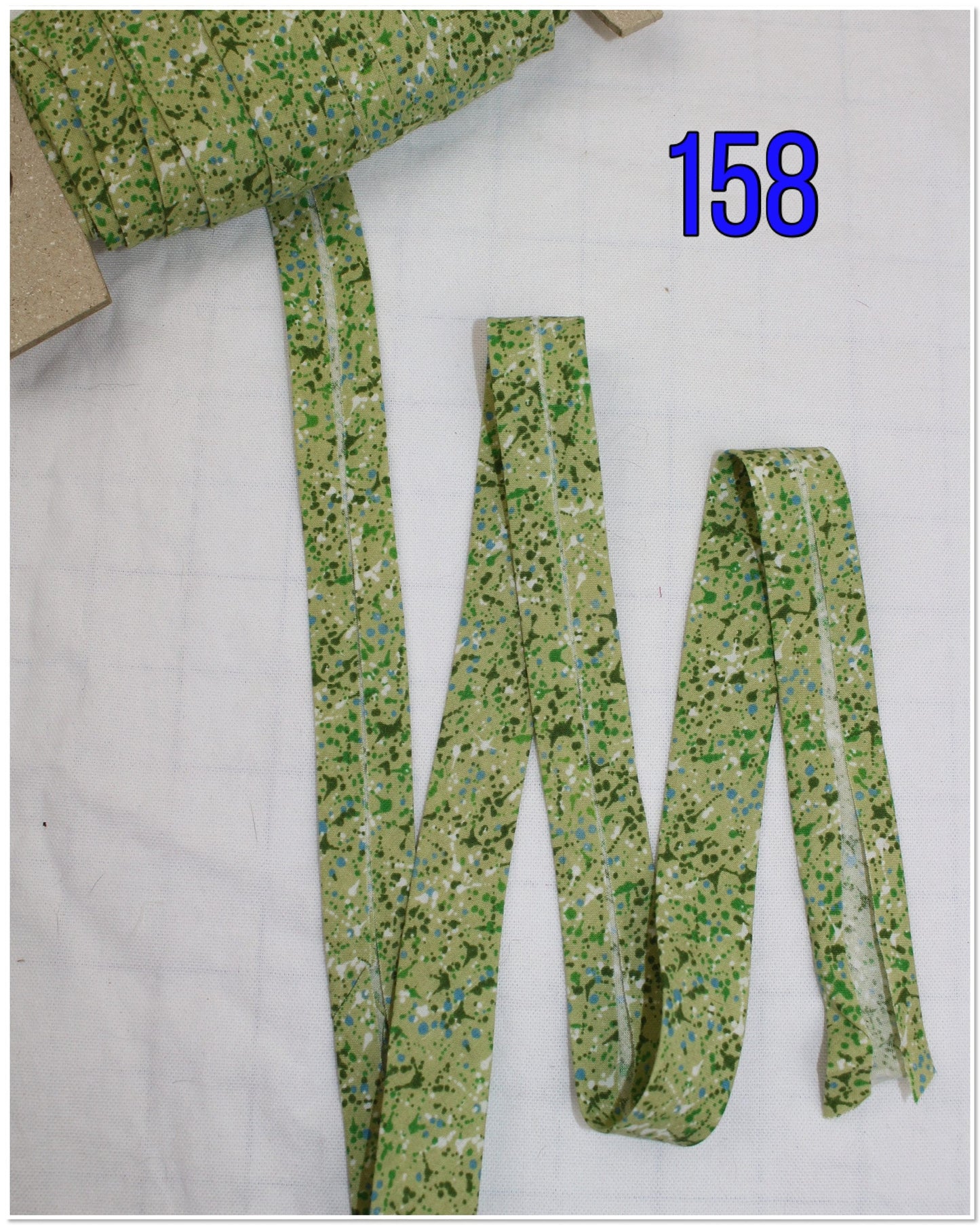 Bias Binding (Tape) 25mm, Cotton, Single Fold. Fusible iron on available. swirls, splats and wavey lines.