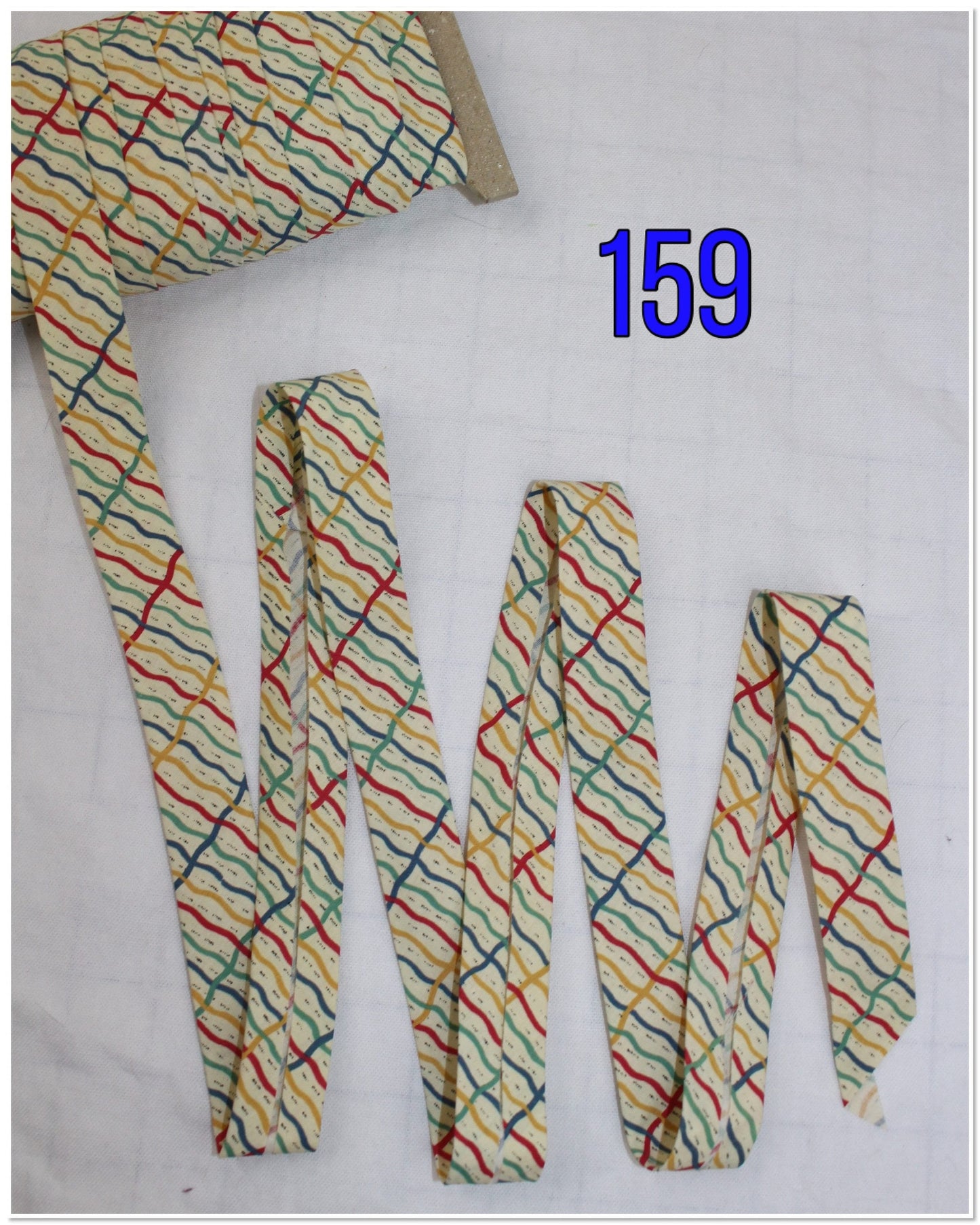 Bias Binding (Tape) 25mm, Cotton, Single Fold. Fusible iron on available. swirls, splats and wavey lines.