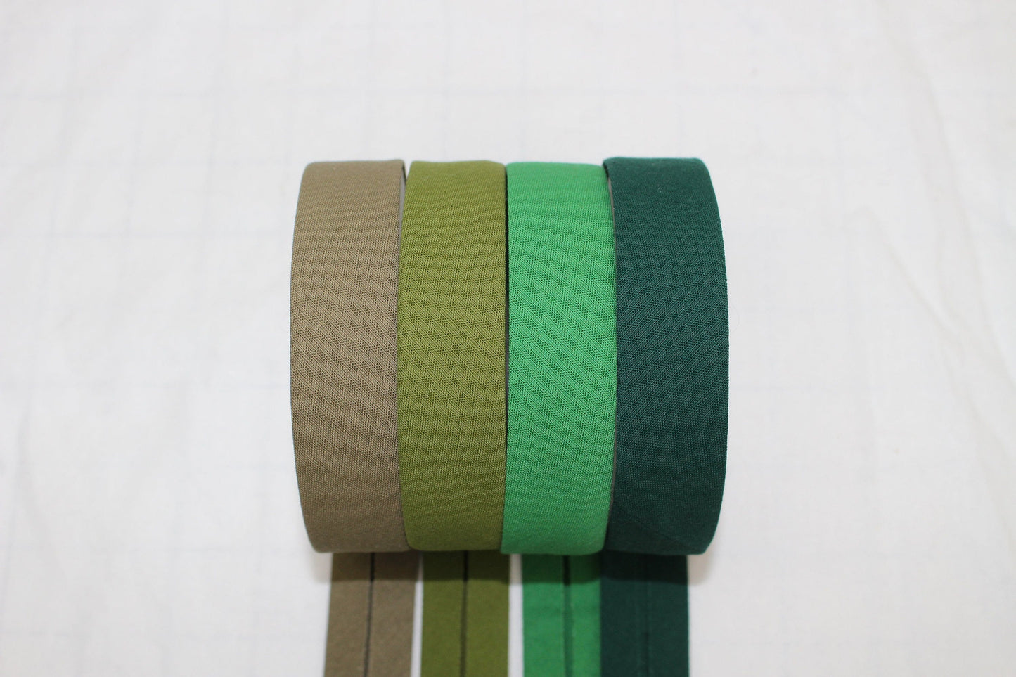 Bias Binding (tape) 25mm or 12mm, single fold, 100% Cotton. green, light green, dark . Fusible iron on available. green