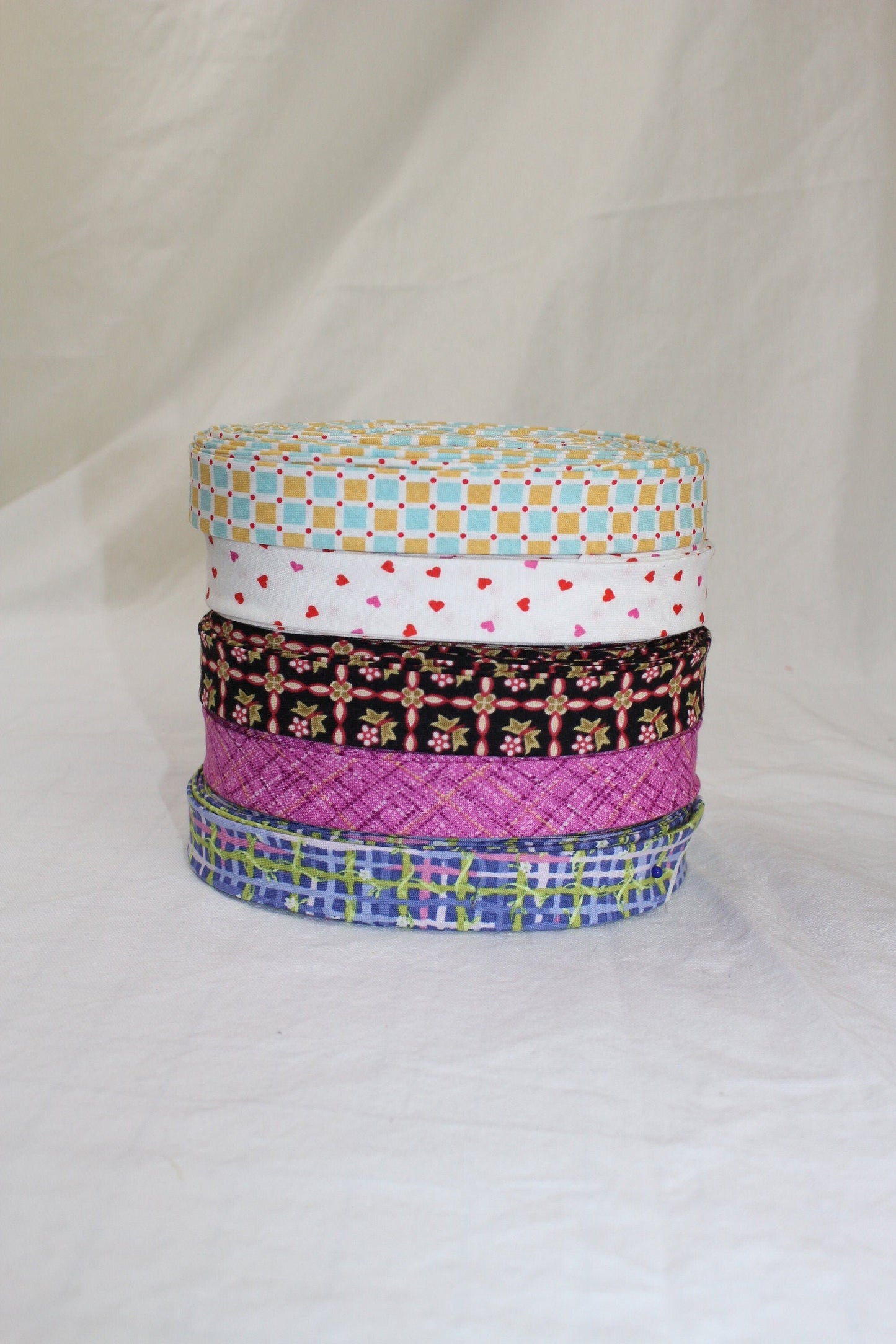 Bias Binding (Tape) 25mm, Cotton, Single Fold, hearts, line patterns. Fusible iron on available.