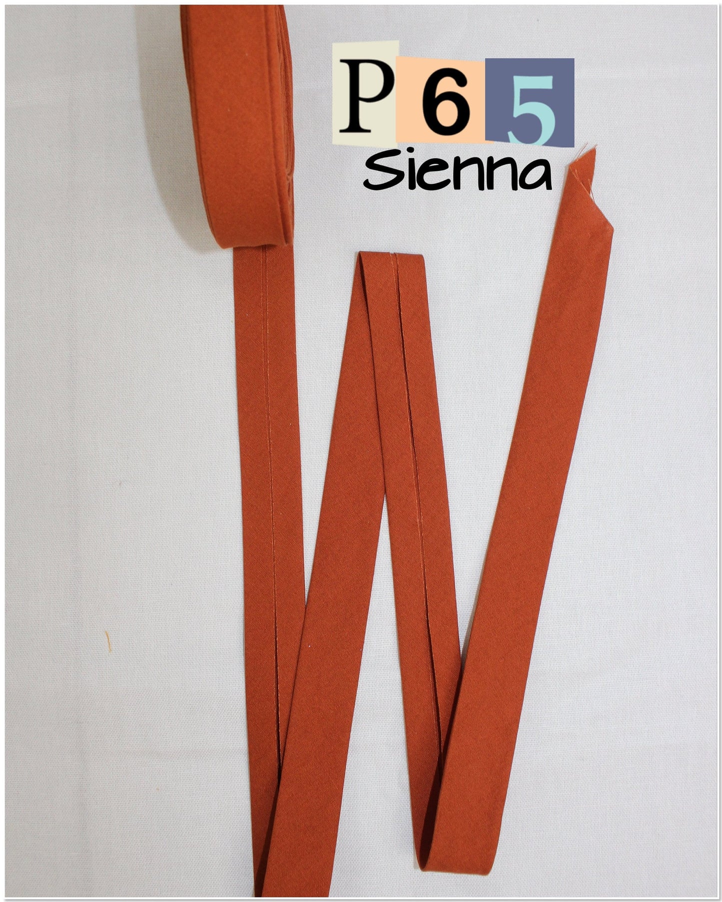 Bias Binding (tape) 25mm or 12mm, single fold, 100% Cotton. coral, orange, pumpkin, sienna. Fusible iron on available.