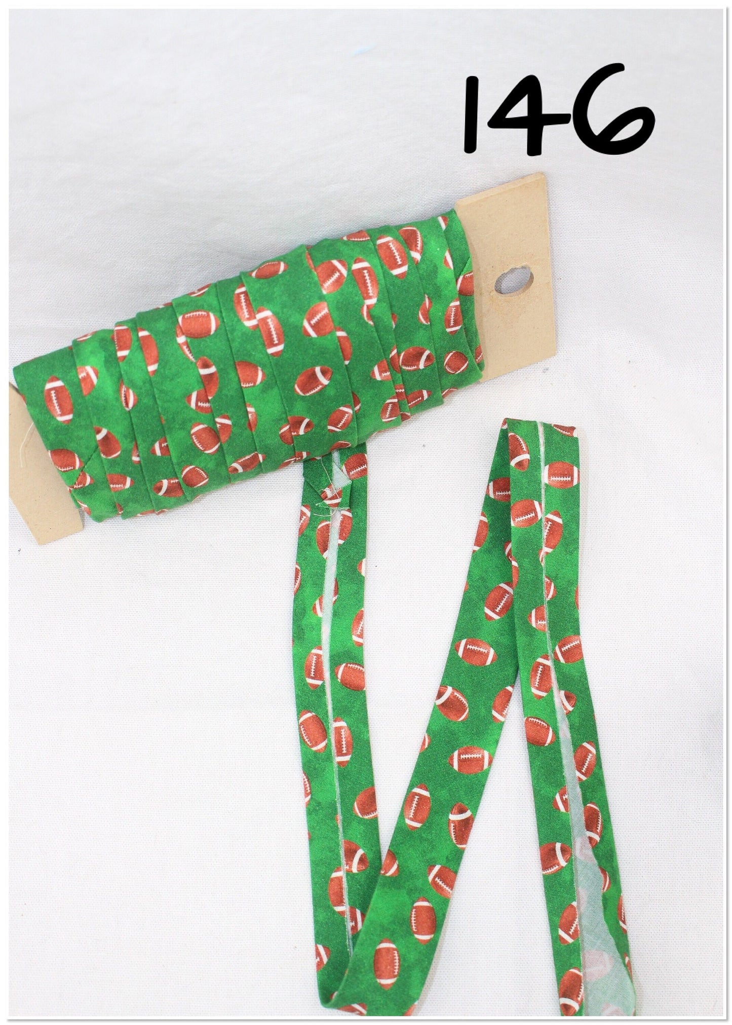 Bias Binding (Tape) 25mm, Cotton, Single Fold, footballs, cars, wheels. Fusible iron on available.