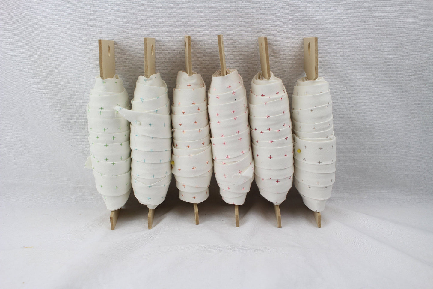 Bias Binding (Tape) 25mm, Cotton, Single Fold, white and crosses. Fusible iron on available.