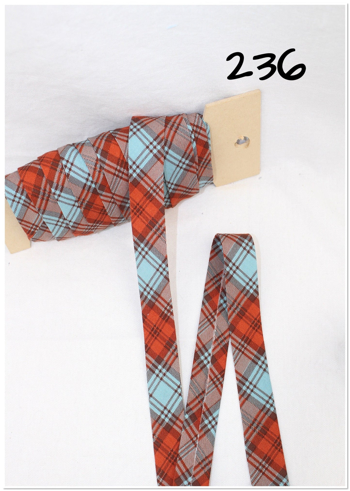 Bias Binding (Tape) 25mm, Cotton, Single Fold, red, black, blue plaid. Fusible iron on available.