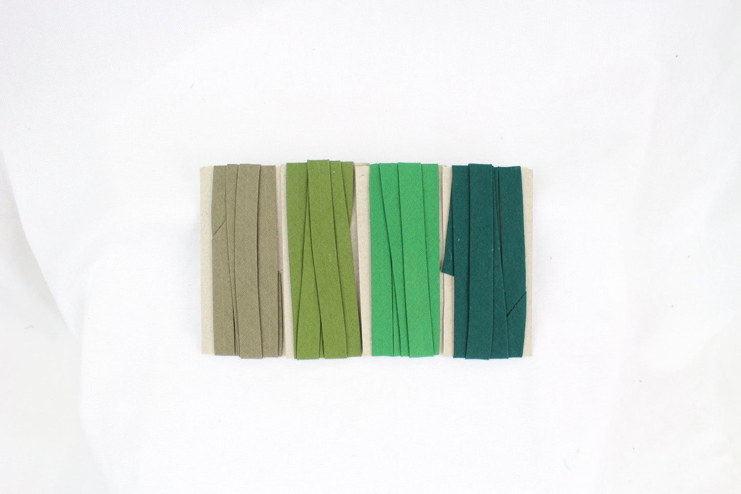 Bias Binding (tape) 12mm, single fold. pesto, hunter green, green grass, olive. Fusible iron on available. 100% Cotton