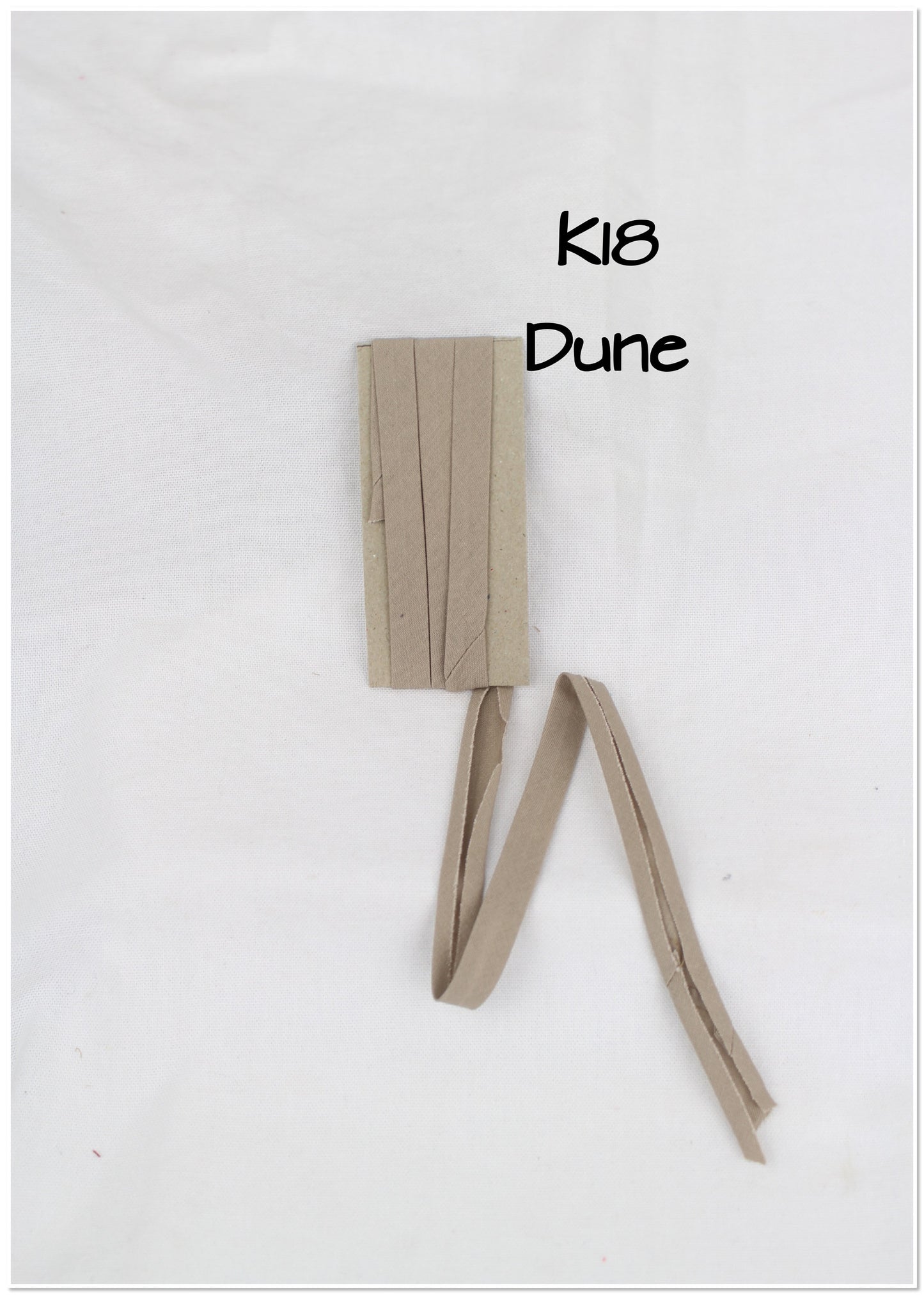 Bias Binding (tape) 12mm, single fold. Dune, doeskin, tan. Fusible iron on available. 100% Cotton