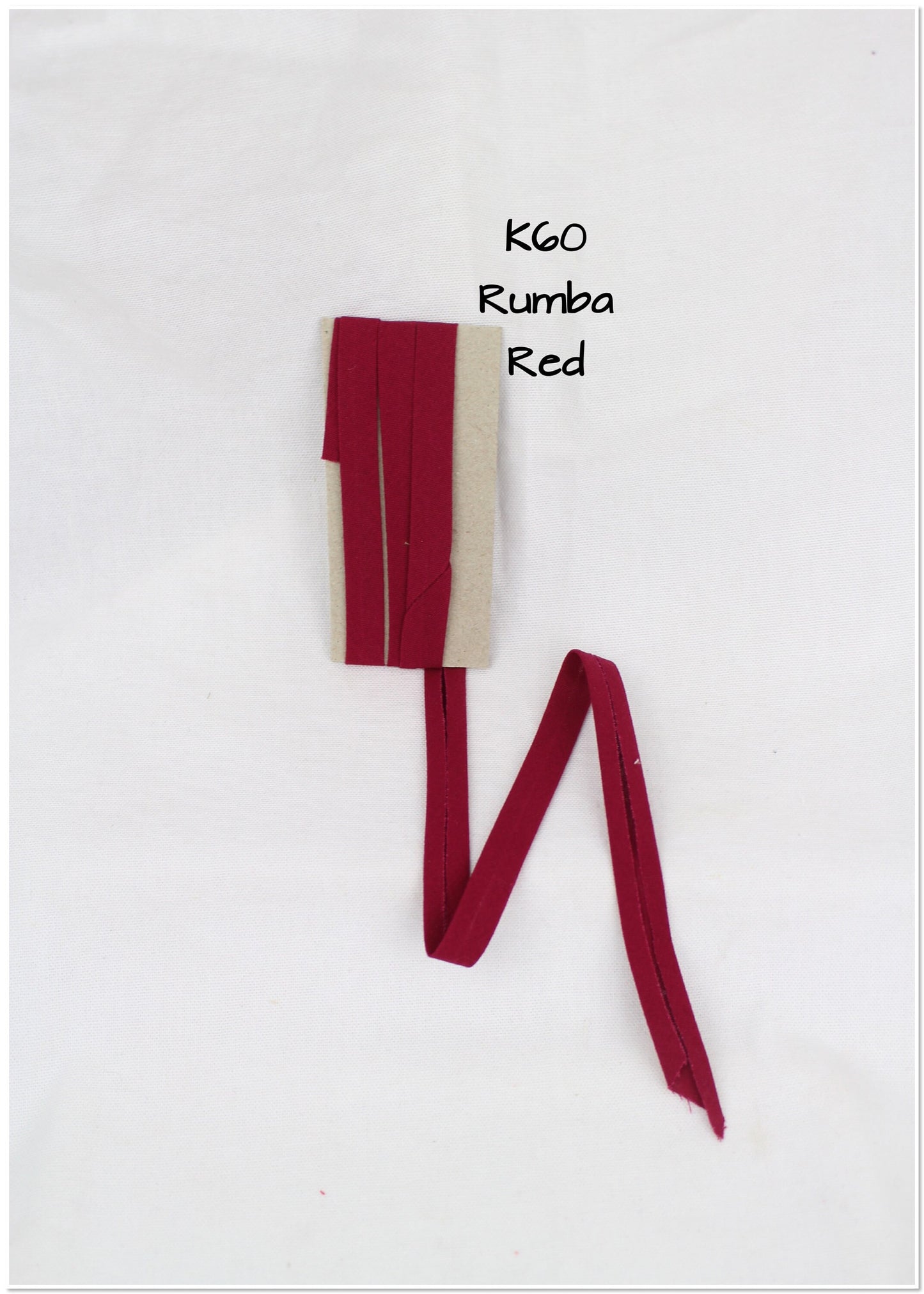 Bias Binding (tape) 25mm, single fold. Cerise, bright rose, rumba red, crimson. Fusible iron on available. 100% Cotton