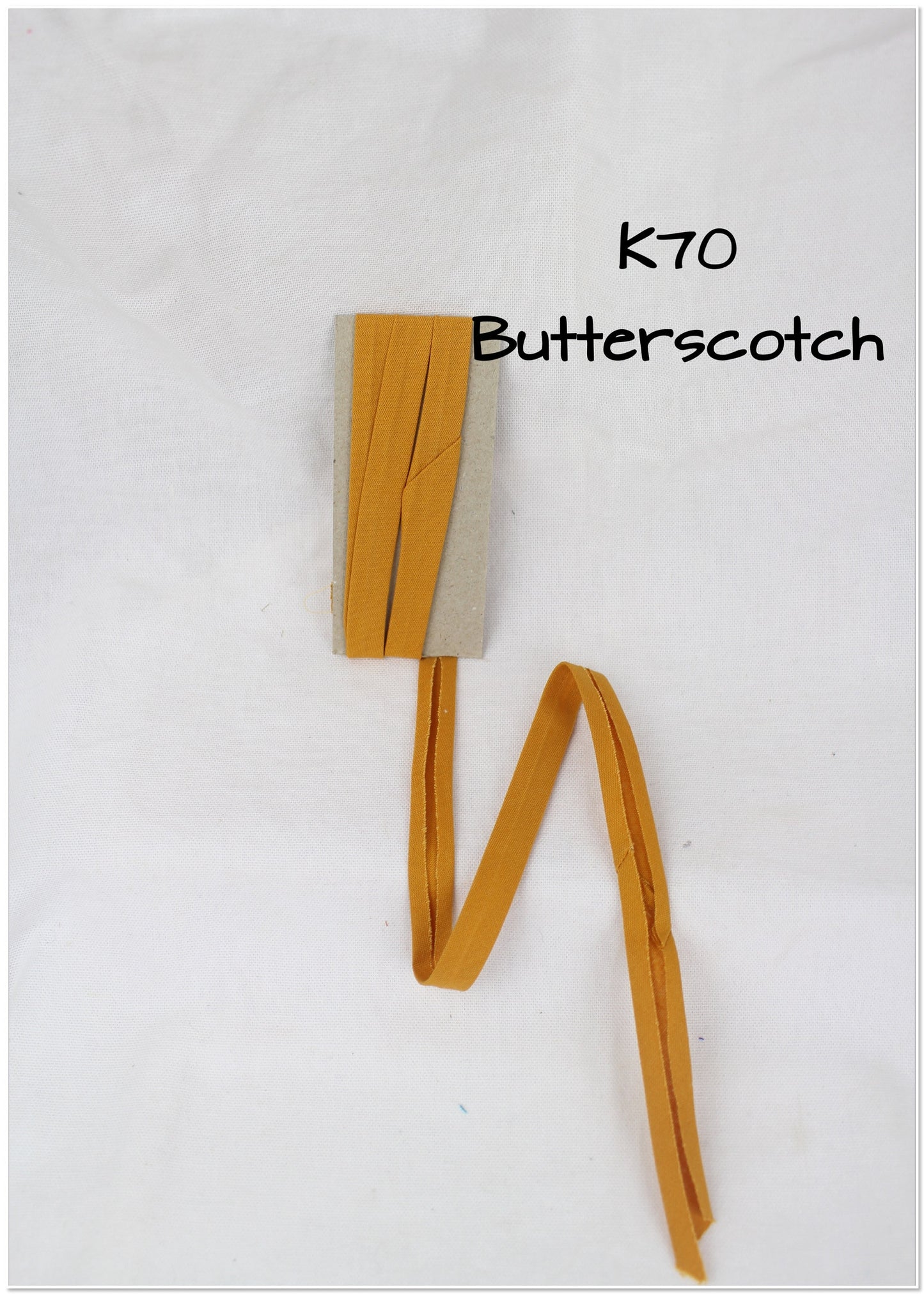 Bias Binding (tape) 25mm, single fold. Pumpkin, butterscotch, sienna. Fusible iron on.