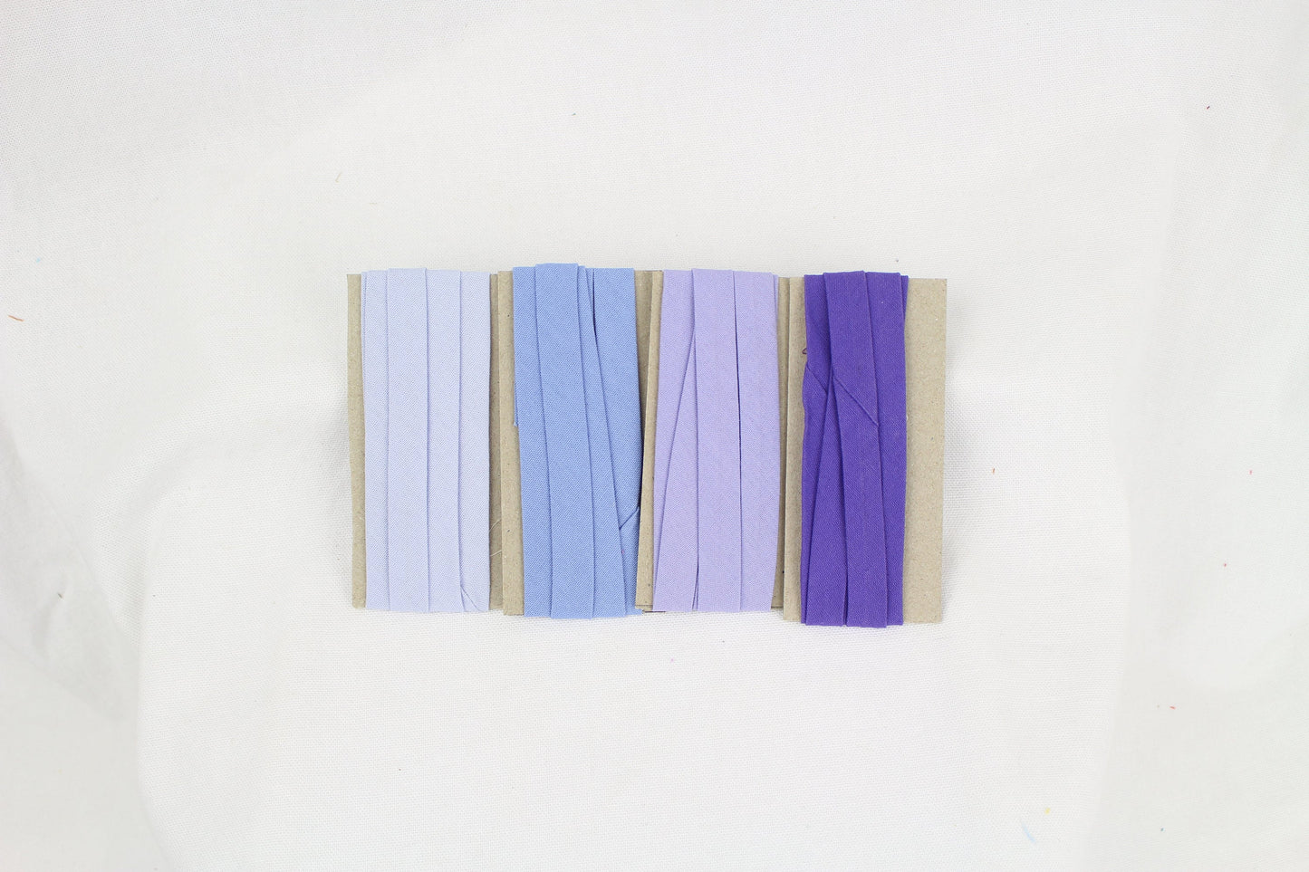 Bias Binding (tape) 12mm, single fold. jacaranda, haze, pompadour, iris. Fusible iron on available. 100% Cotton