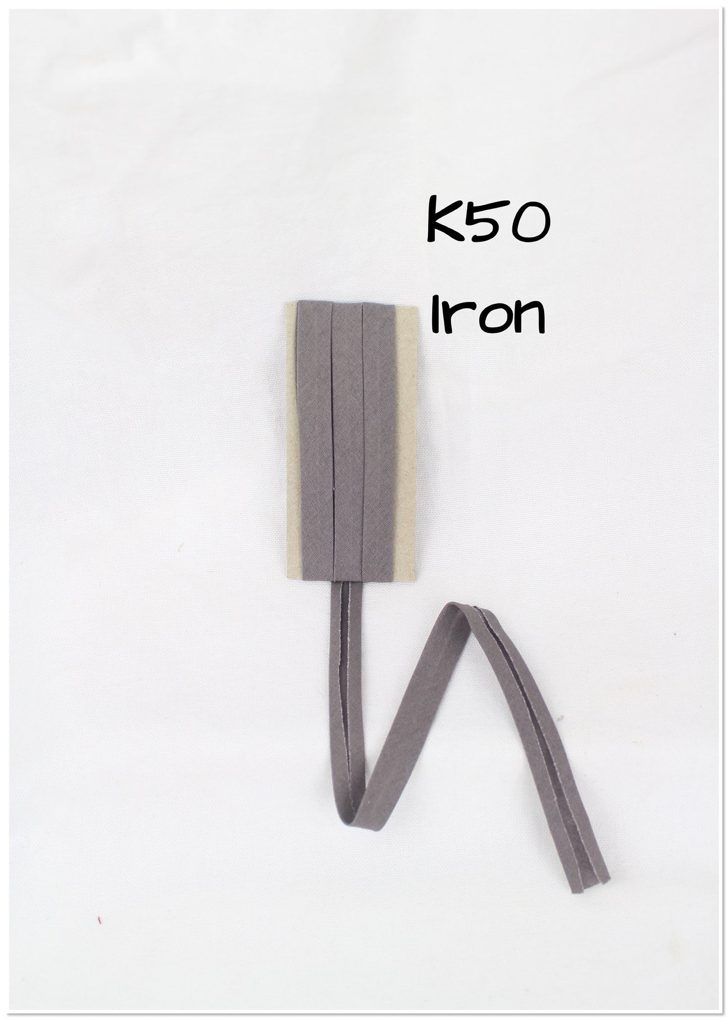 Bias Binding (tape) 12mm, single fold. Neutral grey, iron, light grey. Fusible iron on available. 100% Cotton
