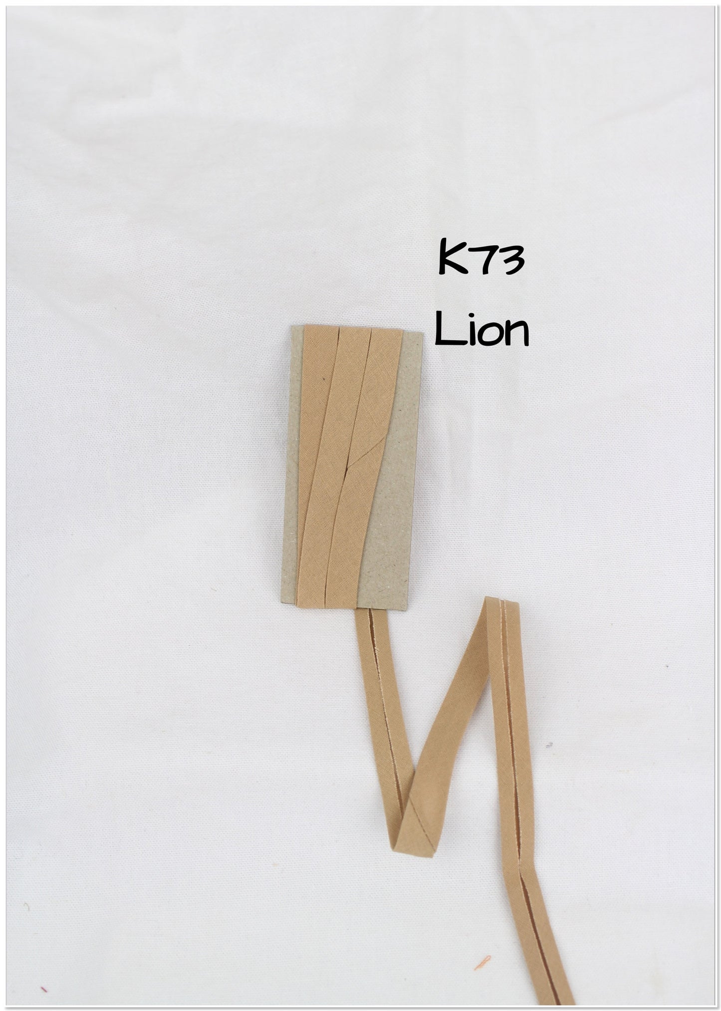 Bias Binding (tape) 12mm, single fold. Dune, lion, spice, cinnamon. Fusible iron on available. 100% Cotton