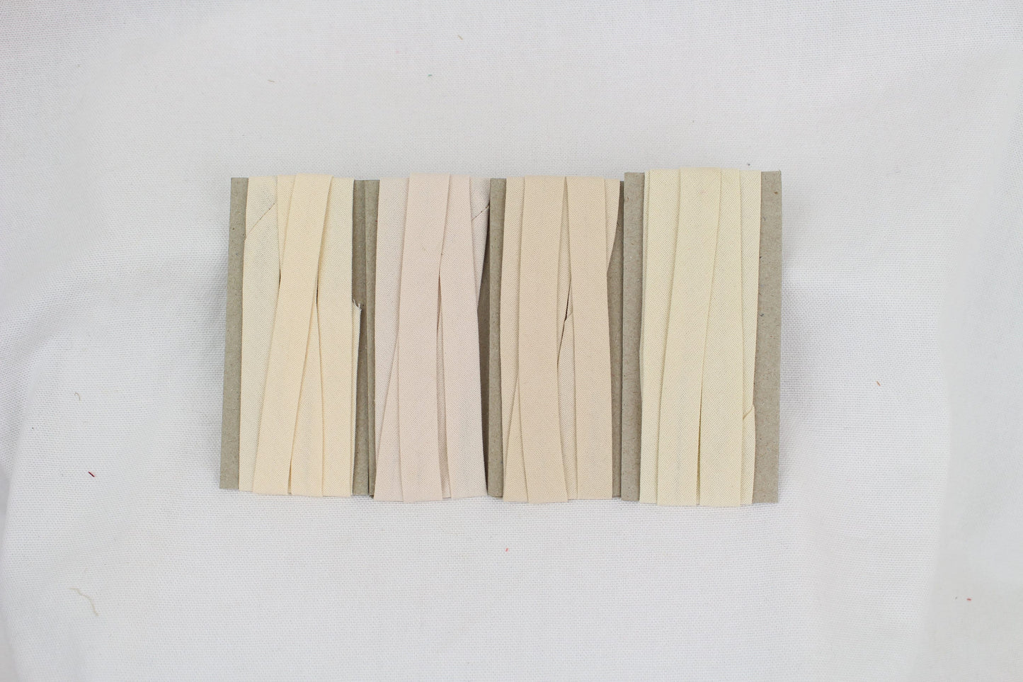 Bias Binding (tape) 12mm, single fold. sand, ivory, pearl, custard. Fusible iron on available. 100% Cotton