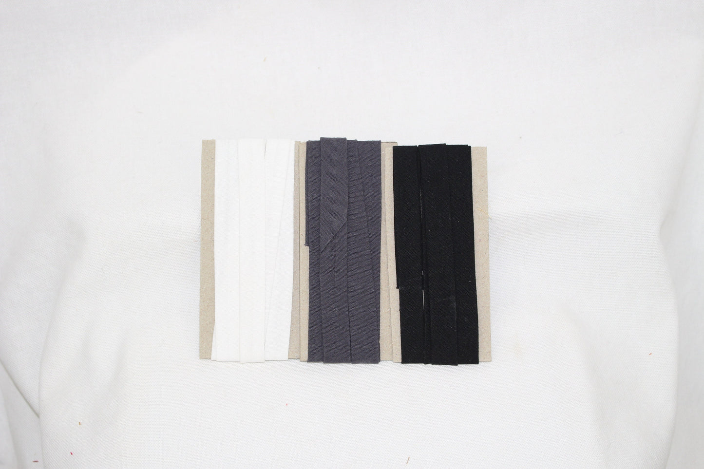 Bias Binding (tape) 12mm, single fold. pebble, white, black. Fusible iron on available. 100% Cotton
