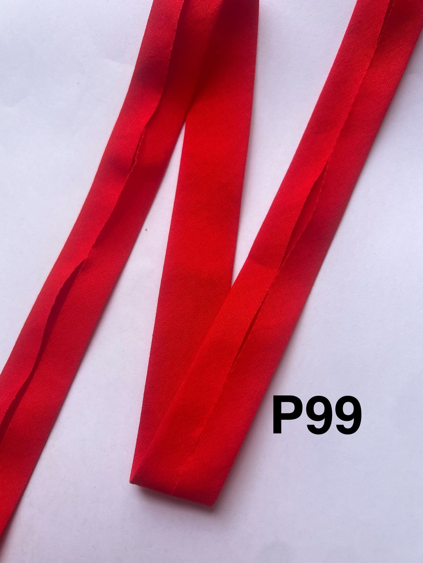 Bias Binding (tape) 25mm, single fold. rich red, dull red, Christmas red, red. Fusible iron on available. 100% Cotton