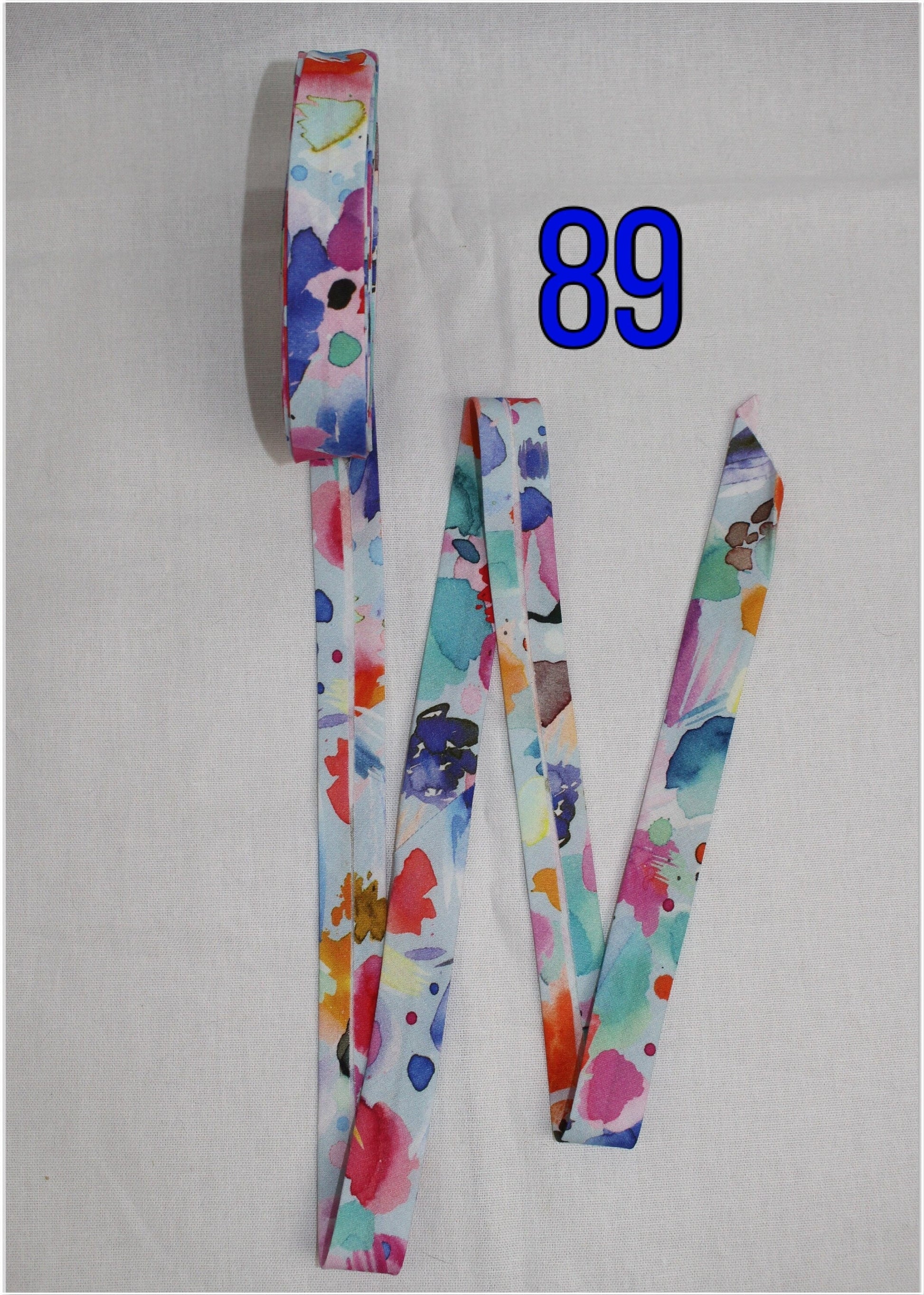 Bias Binding (Tape) 25mm, Cotton, Single Fold. Fusible iron on available. watercolour, rainbow, colourful, swirls.