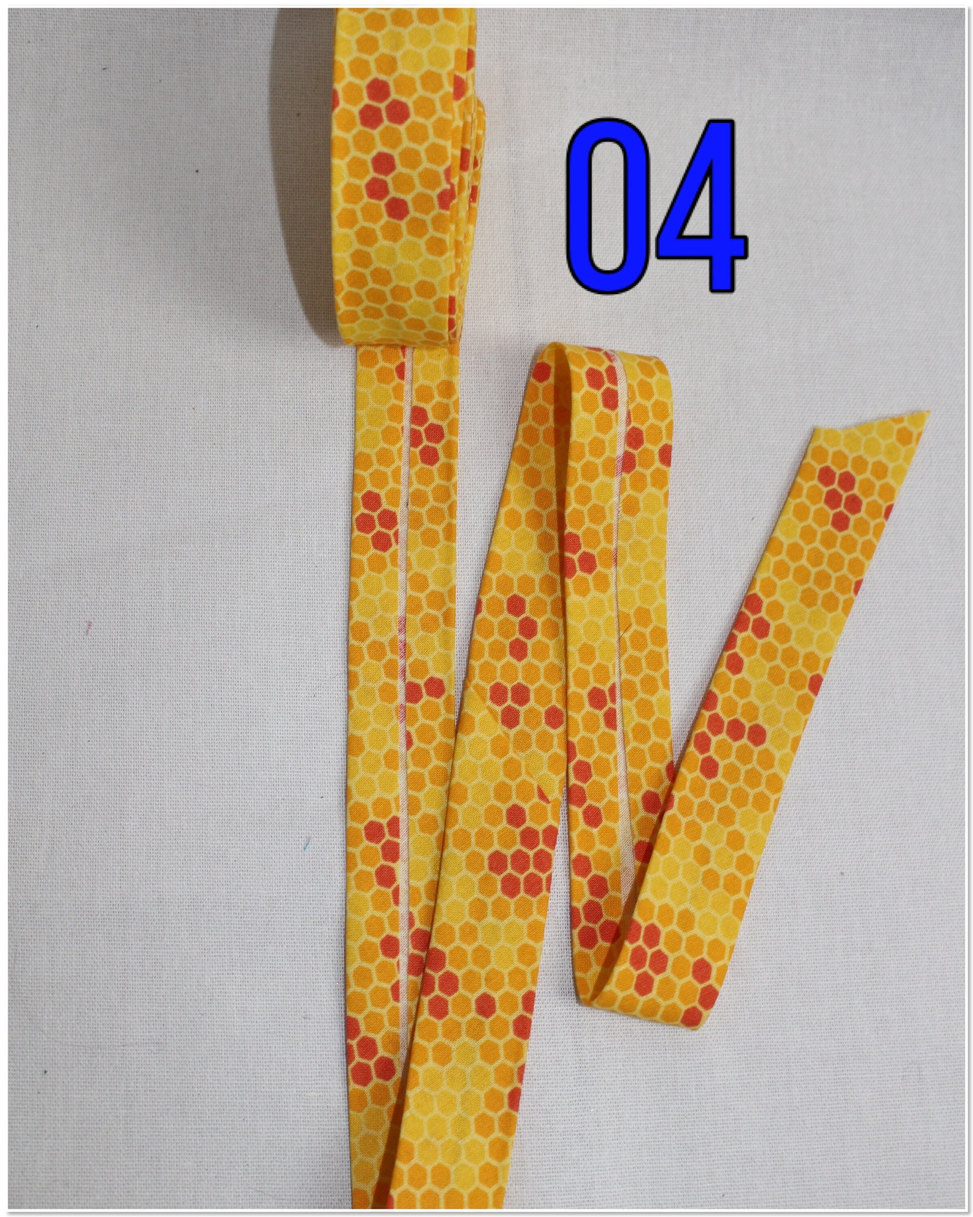 Bias Binding (Tape) 25mm, Cotton, Single Fold, bee, honeycomb. Fusible iron on available.
