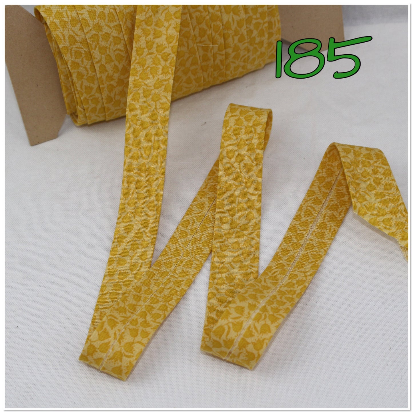 Bias Binding (Tape) 25mm, Cotton, Single Fold, yellow pattern. Fusible iron on available.