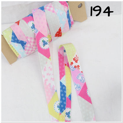 Bias Binding (Tape) 25mm, Cotton, Single Fold, patterned. Fusible iron on available.