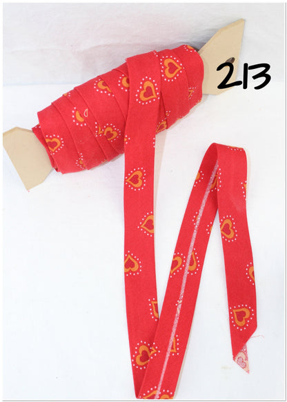Bias Binding (Tape) 25mm, Cotton, Single Fold, orange, red, patterned. Fusible iron on available.