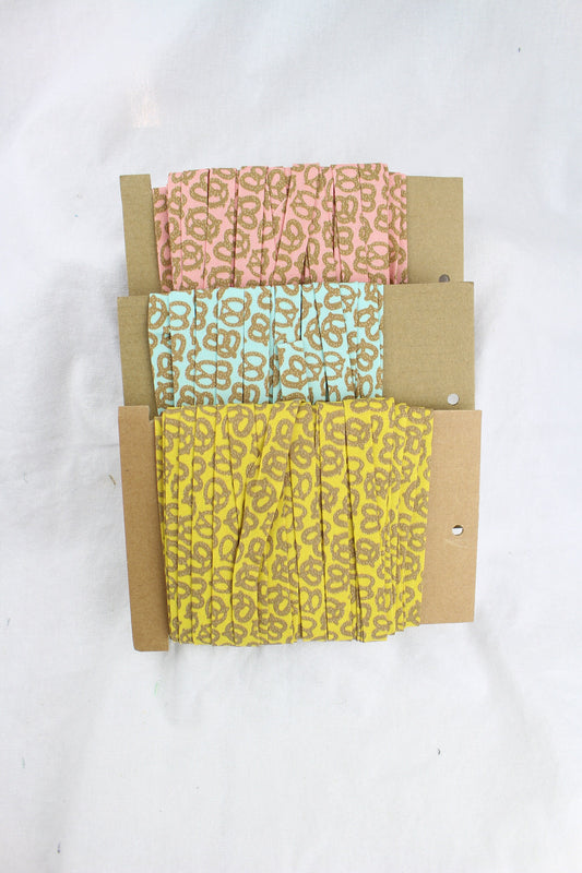 Bias Binding (Tape) 12mm, Cotton, Single Fold, pretzels. Fusible iron on available.