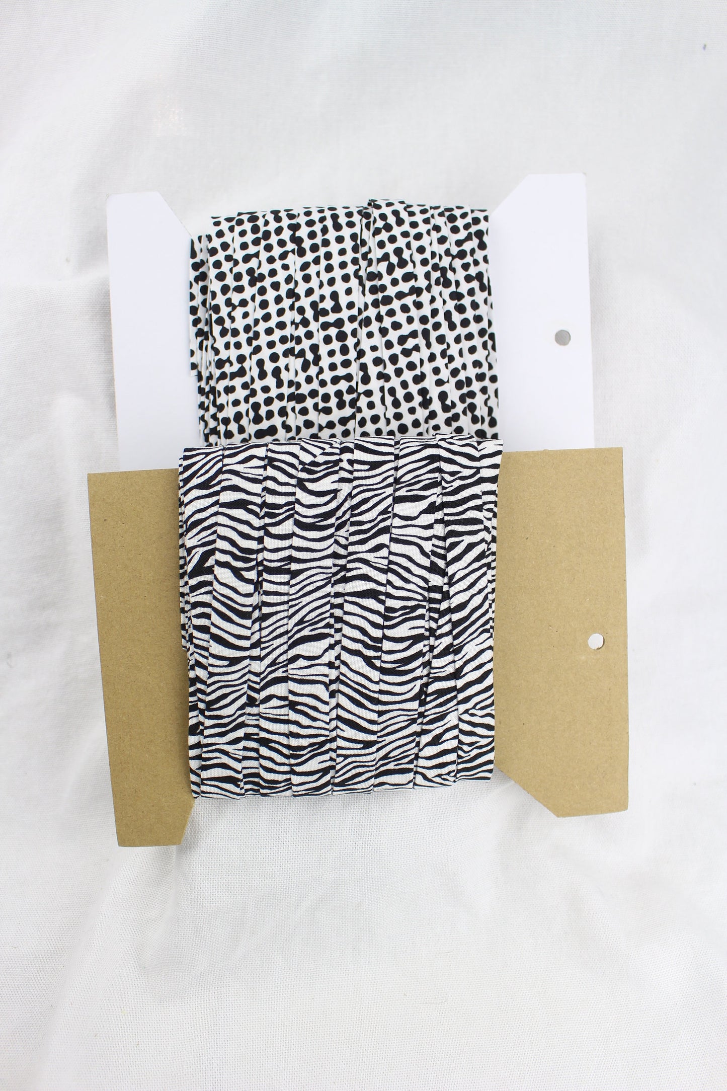 Bias Binding (Tape) 12mm, Cotton, Single Fold, black and white dots and stripes. Fusible iron on available.