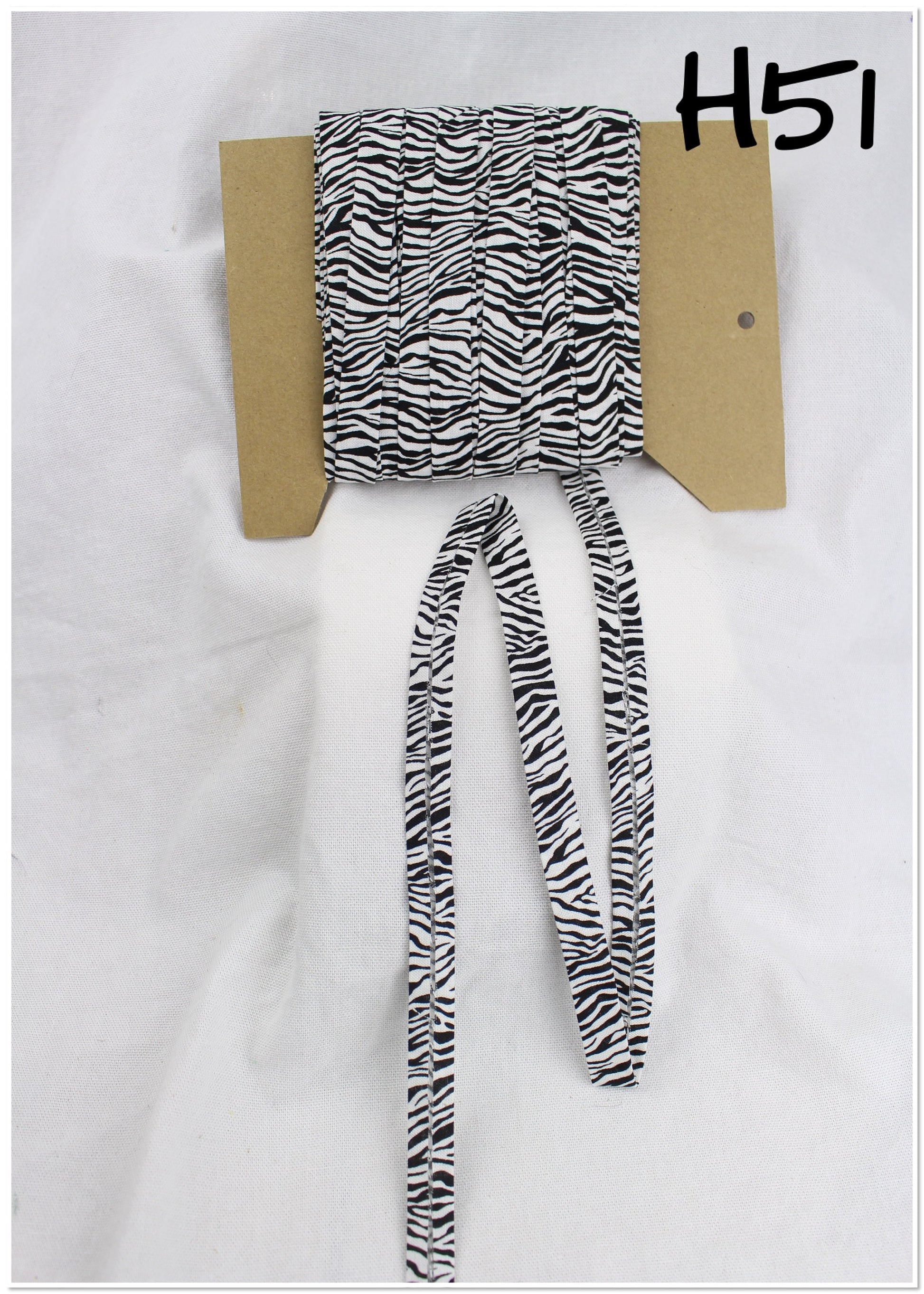 Bias Binding (Tape) 12mm, Cotton, Single Fold, black and white dots and stripes. Fusible iron on available.