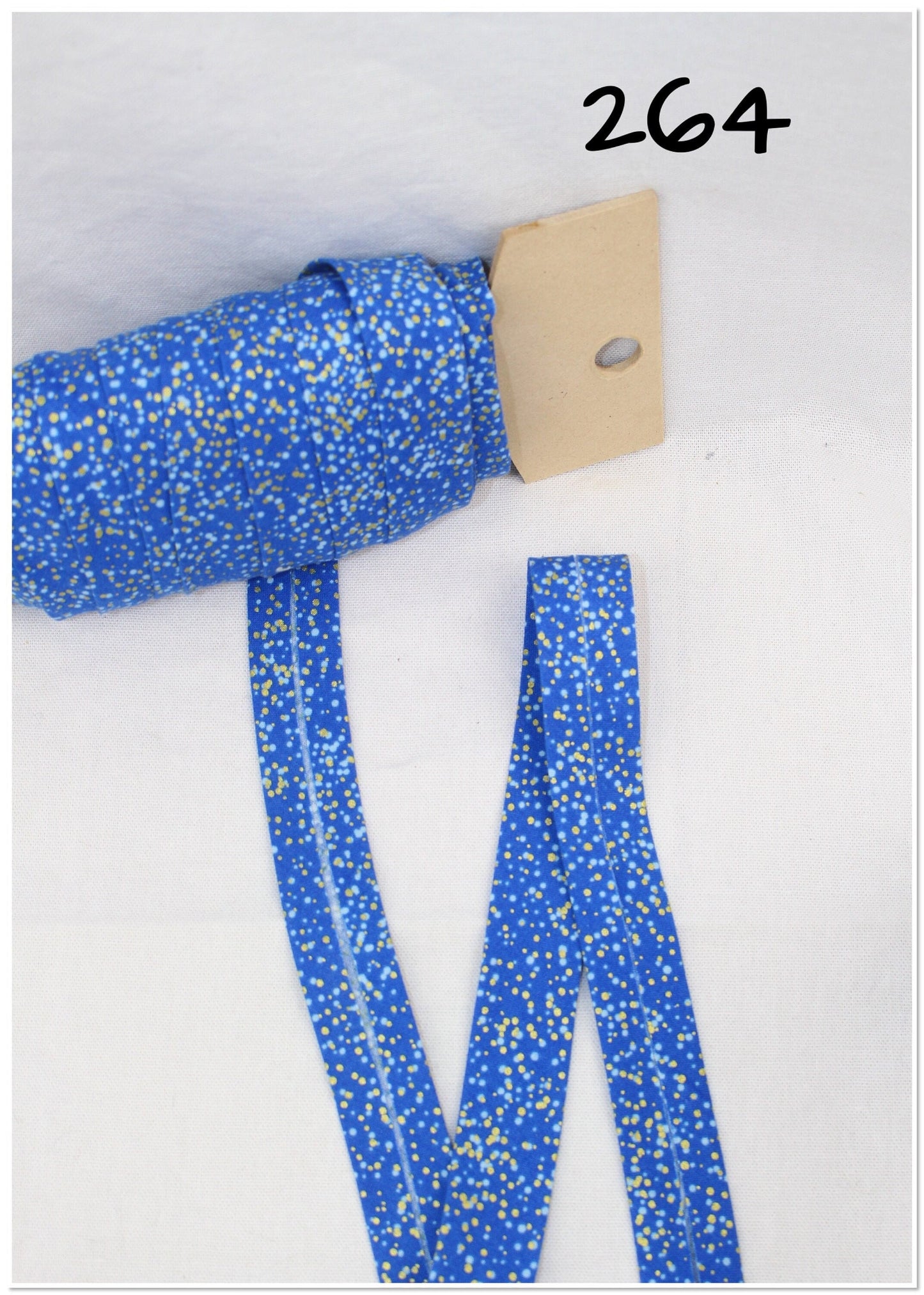 Bias Binding (Tape) 25mm, Cotton, Single Fold, dots, iron and thread. Fusible iron on available.