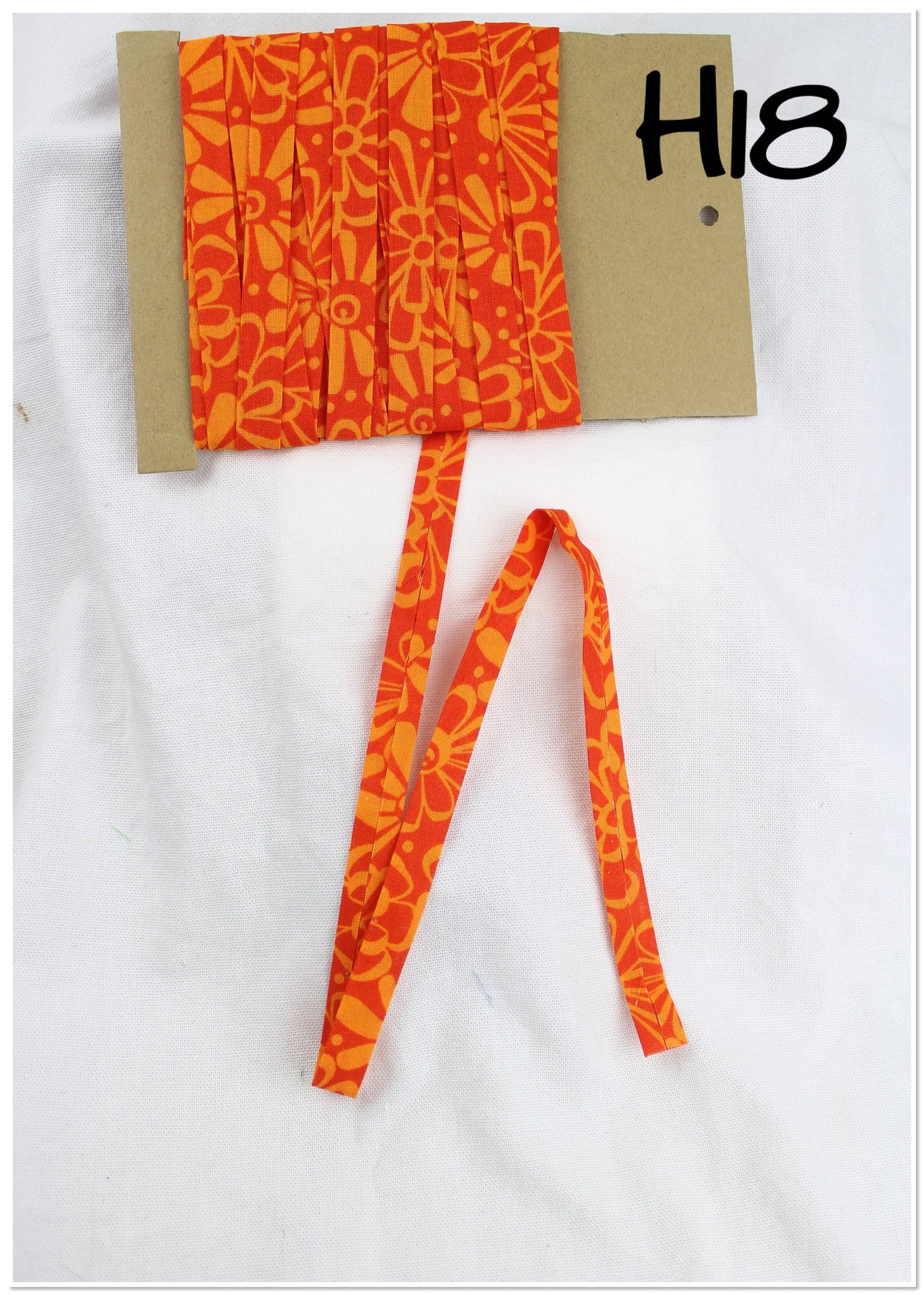 Bias Binding (Tape) 12mm, Cotton, Single Fold, tangerine dream and maui. Fusible iron on available.