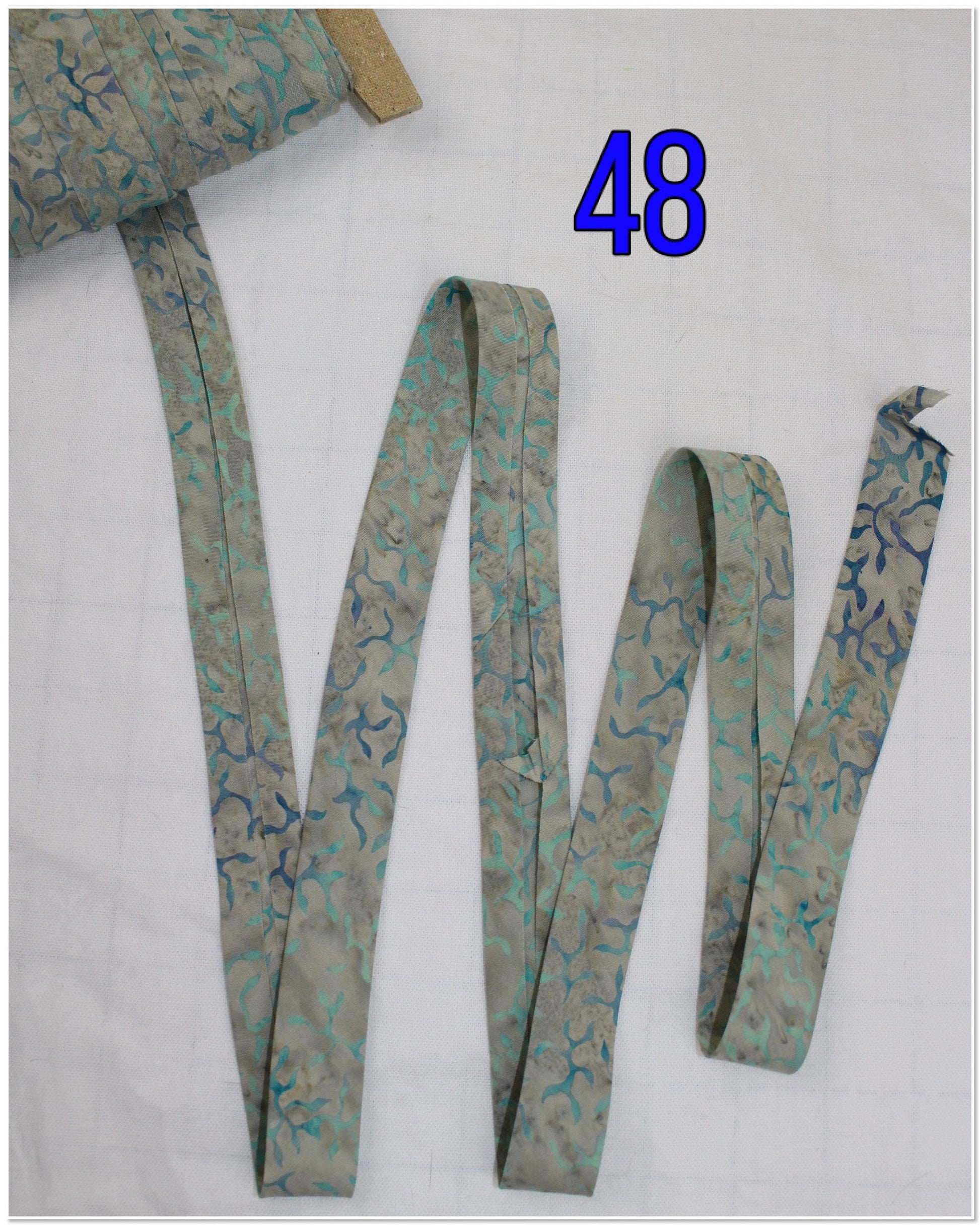 Bias Binding (Tape) 25mm, Cotton, Single Fold, Batik, geo. Fusible iron on available.