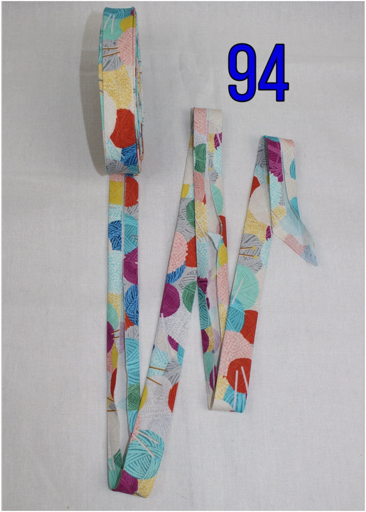 Bias Binding (Tape) 25mm, Cotton, Single Fold. Fusible iron on available. Wool, mermaid scales, flowers, floral, colourful.