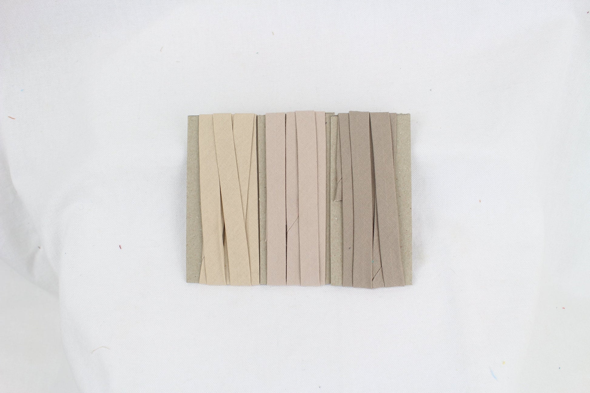 Bias Binding (tape) 12mm, single fold. Dune, doeskin, tan. Fusible iron on available. 100% Cotton