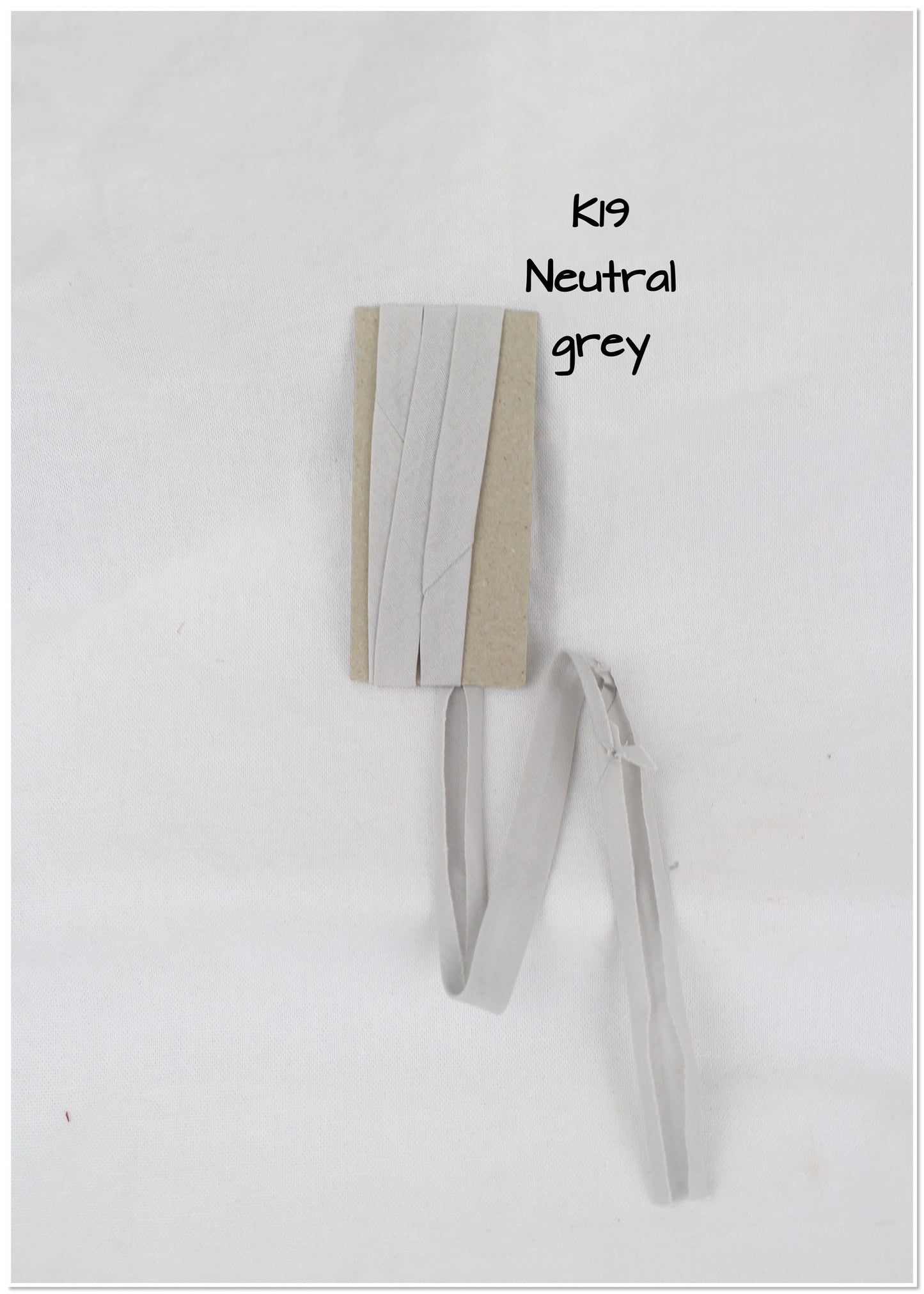 Bias Binding (tape) 12mm, single fold. Neutral grey, iron, light grey. Fusible iron on available. 100% Cotton