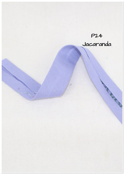 Bias Binding (tape) 25mm, single fold. jacaranda, haze, pompadour. Fusible iron on available. 100% Cotton
