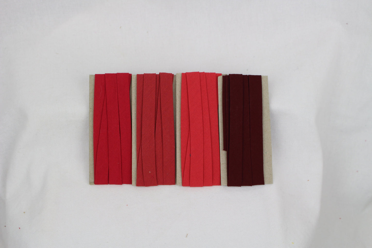 Bias Binding (tape) 12mm, single fold. brick red, rosewood, Chinese red, brick red, crimson. Fusible iron on available. 100% Cotton